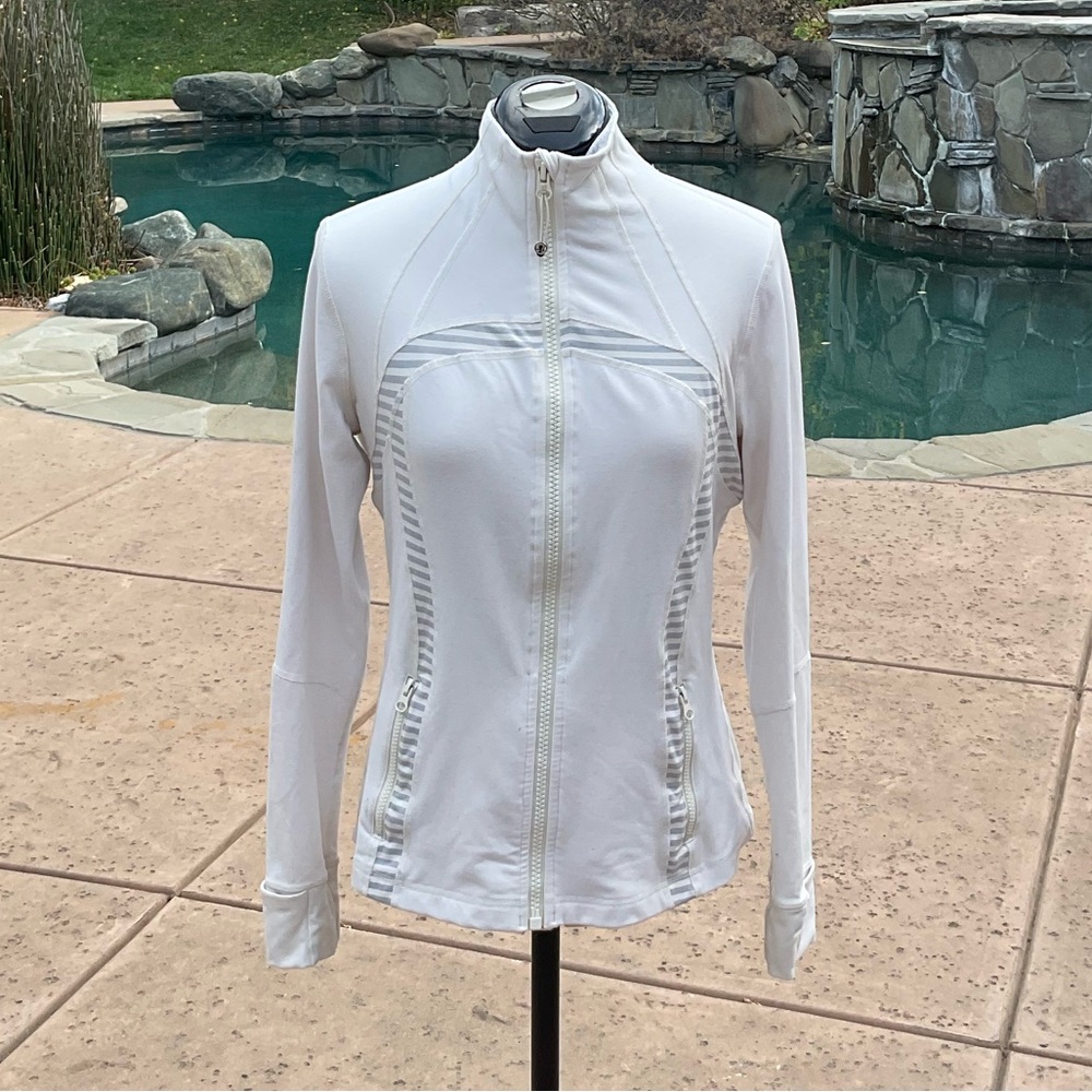 LuLulemon define jacket in white with grey detailing.